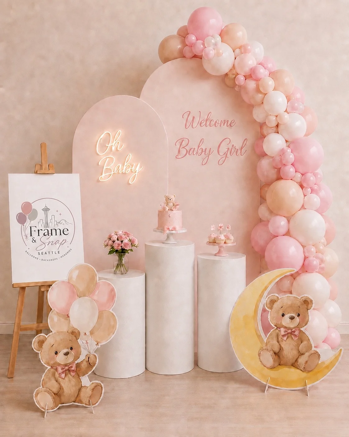 Frame & Snap blush and cream welcome-baby backdrop with teddy-bear decorations
